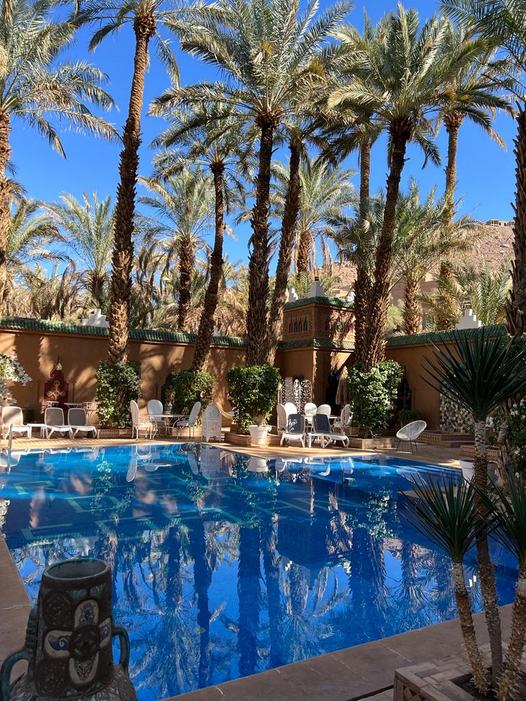 Pool and palm trees at Free People Riad and Spa Marrakech